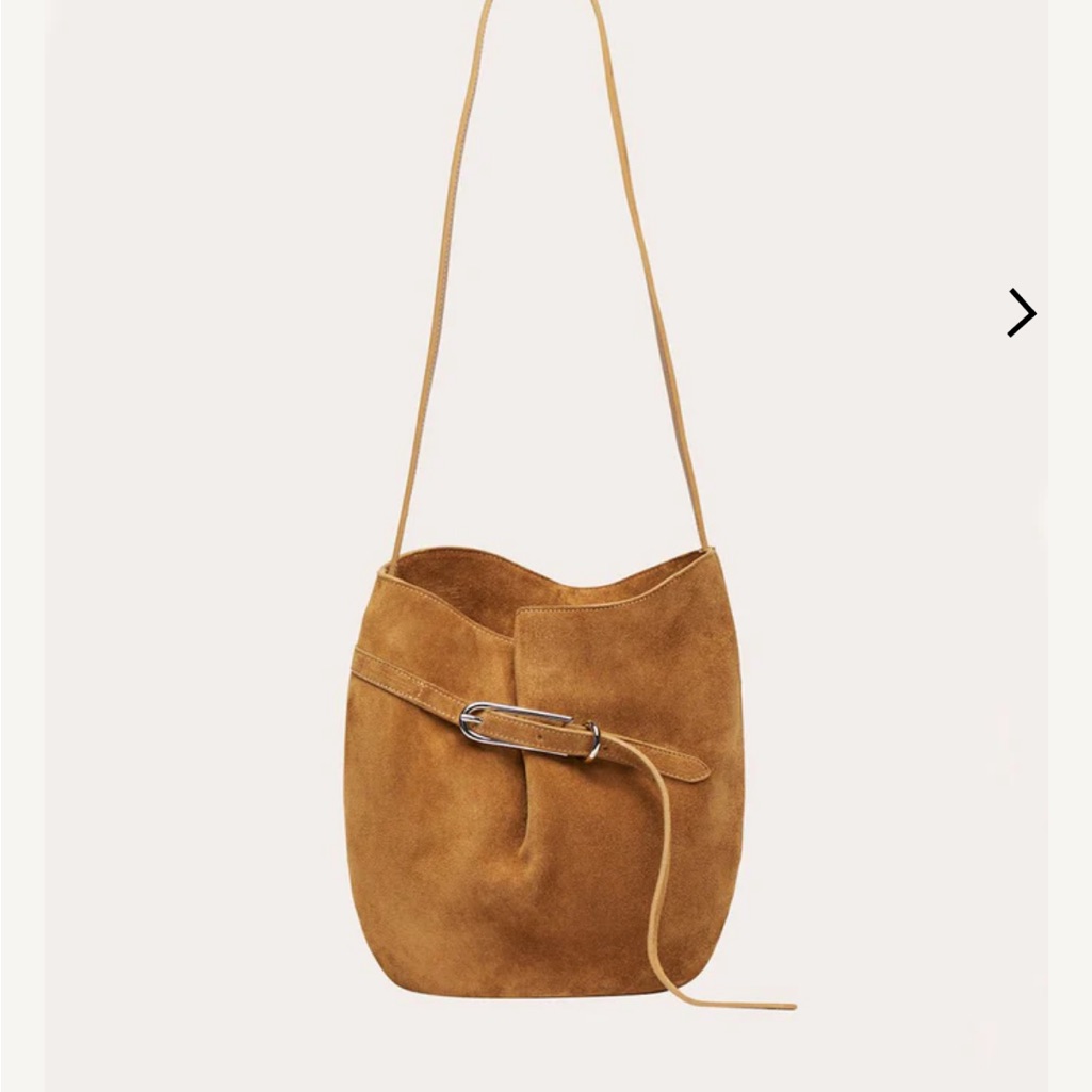 Suede Bucket Shoulder Bag With Decorative Belt In Tan